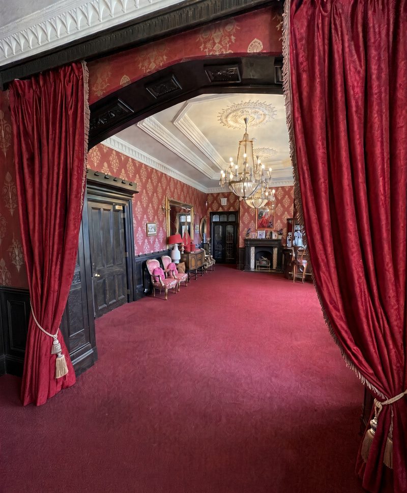 The Red Room seen through its red curtains – Ingress Abbey